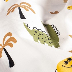 Tissu Jersey coton Dinosaures Joyeux et Palmiers Fond Blanc Cassé | Tissus Loup